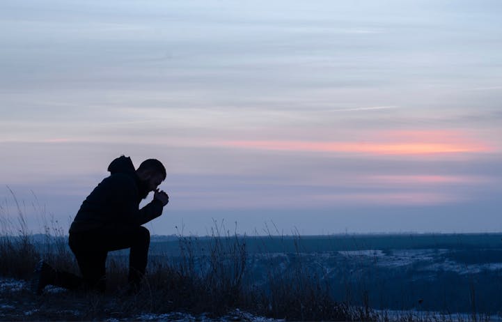 A man prays