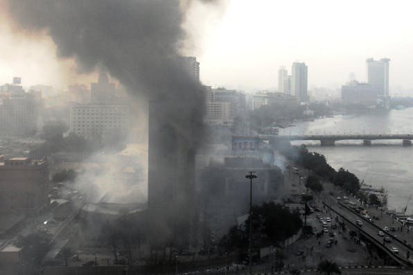 National Democratic Party Headquarters in Cairo burning on 29 January 2011 (Alisdare Hickson, Wikimedia Commons) National Democratic Party Headquarters in Cairo burning on 29 January 2011 (Alisdare Hickson, Wikimedia Commons)