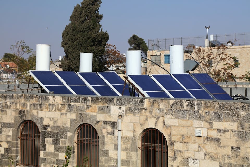 Roof solar powered water heaters in Jerusalem, Israel. (Shutterstock) Roof solar powered water heaters in Jerusalem, Israel. (Shutterstock)