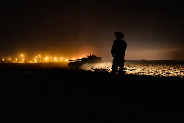 Israeli Tank on its way to the border in 18th 2014 in the fields around Gaza Strip during Operation "Protective Edge" (Shutterstock)