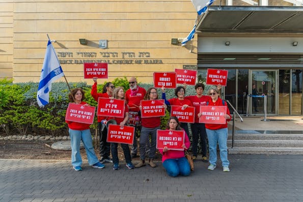 Activist group Bonot Alternativa protests near the Rabbinical Court in Haifa, Israel (Shutterstock)