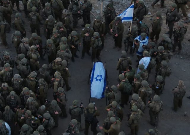 Israeli soldiers surround the coffin of Ran Gvili. (IDF) Israeli soldiers surround the coffin of Ran Gvili. (IDF)