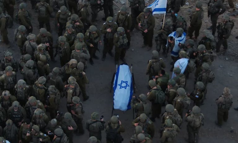 Israeli soldiers surround the coffin of Ran Gvili. (IDF) Israeli soldiers surround the coffin of Ran Gvili. (IDF)