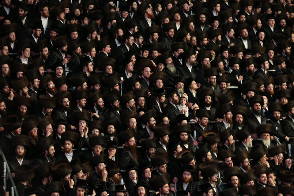 Thousands of ultra orthodox hasidic Jews attend and sit in the bleachers at the grand wedding of the Belzer Rebbe's granddaughter (Shutterstock) Thousands of ultra orthodox hasidic Jews attend and sit in the bleachers at the grand wedding of the Belzer Rebbe's granddaughter (Shutterstock)