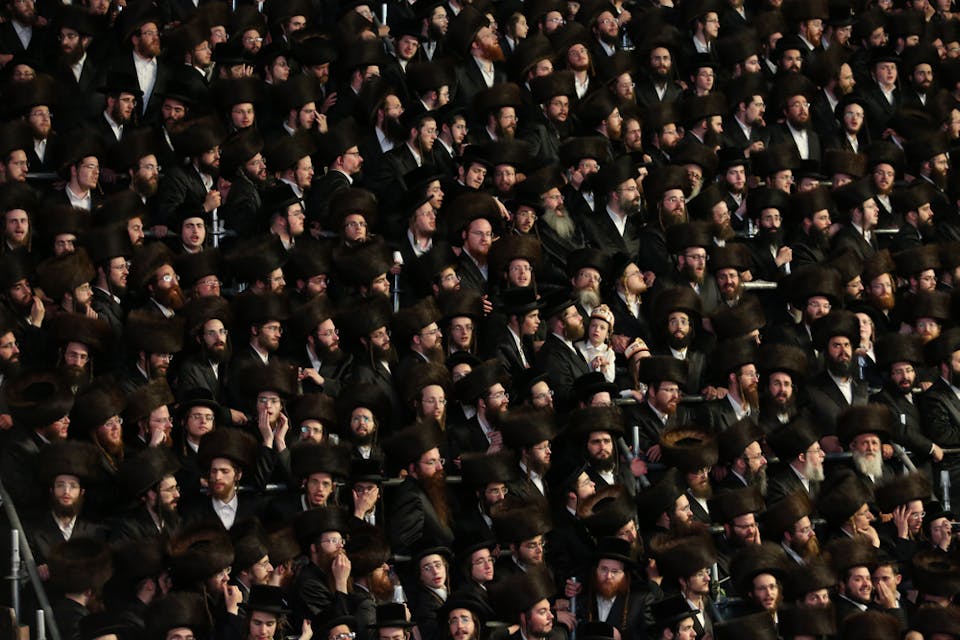 Thousands of ultra orthodox hasidic Jews attend and sit in the bleachers at the grand wedding of the Belzer Rebbe's granddaughter (Shutterstock)