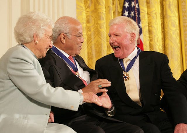 Paul Johnson is congratulated by Dr. Norman C. Francis and Ruth Johnson Colvin after receiving the Presidential Medal of Freedom from President George W. Bush in 2006 (Wikimedia Commons) Paul Johnson is congratulated by Dr. Norman C. Francis and Ruth Johnson Colvin after receiving the Presidential Medal of Freedom from President George W. Bush in 2006 (Wikimedia Commons)