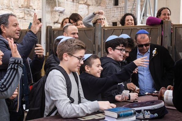 Family celebrating a bar mitzvah at the Kotel in Jerusalem (Shutterstock) Family celebrating a bar mitzvah at the Kotel in Jerusalem (Shutterstock)