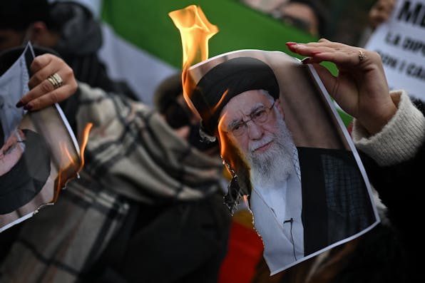 Ali Khamenei's picture is burned in Milan, Italy, on January 17, 2026. (Image via Shutterstock.) Khamenei's picture is burned