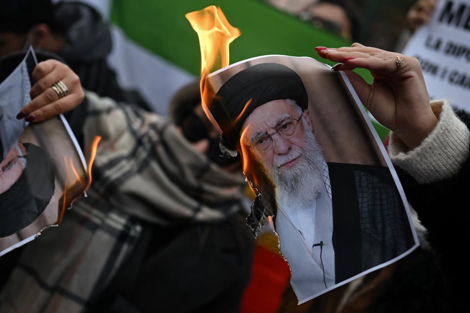 Ali Khamenei's picture is burned in Milan, Italy, on January 17, 2026. (Image via Shutterstock.) Khamenei's picture is burned