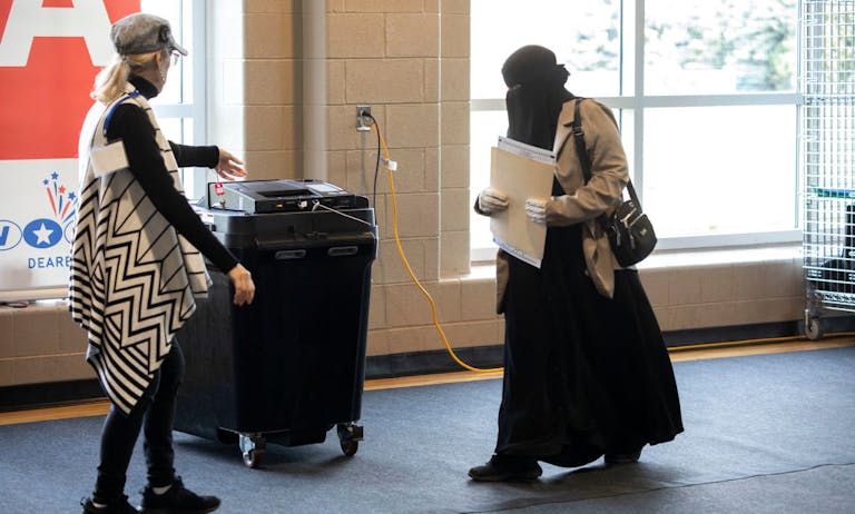 Voters cast their ballots on October 29, 2024 in Dearborn, Michigan. (Bill Pugliano/Getty Images) Voters-cast-their-ballots