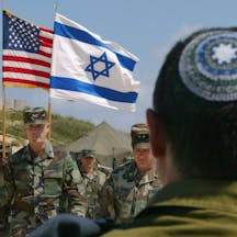 Israeli and American personnel at the IDF’s Tel Yona base on April 20, 2003. (David Silverman/Getty Images) Israeli-and-american-personnel
