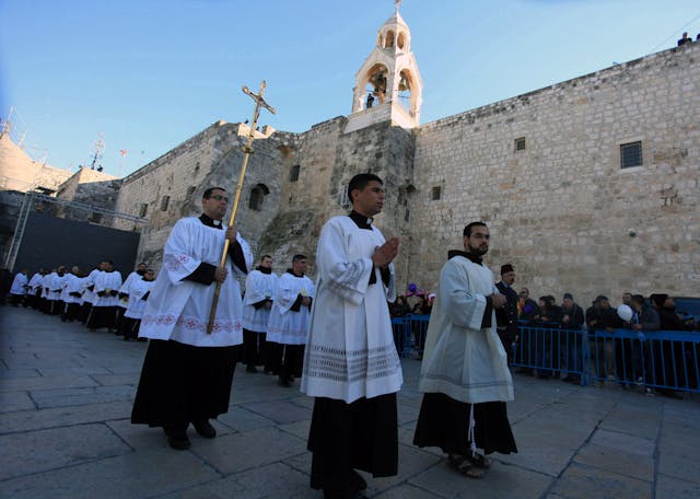 A Christmas procession Bethlehem (Issam Rimawi/Anadolu/Getty Images) A Christmas procession Bethlehem (Issam Rimawi/Anadolu/Getty Images)