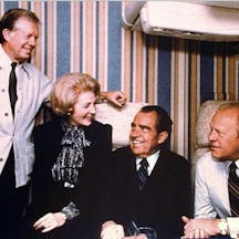 Former U.S. Presidents Jimmy Carter, Richard Nixon and Gerald Ford, pose with U.S. Chief of Protocol Leonore Annenberg during their flight from Washington to attend the funeral of Egyptian President Anwar Sadat in 1981. Former U.S. Presidents Jimmy Carter, Richard Nixon and Gerald Ford, pose with U.S. Chief of Protocol Leonore Annenberg during their flight from Washington to attend the funeral of Egyptian President Anwar Sadat in 1981.