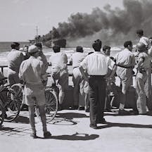 Watching the Altalena burn. (Israel Government Press Office via Wikimedia.) Watching the Altalena burn. (Israel Government Press Office via Wikimedia.)