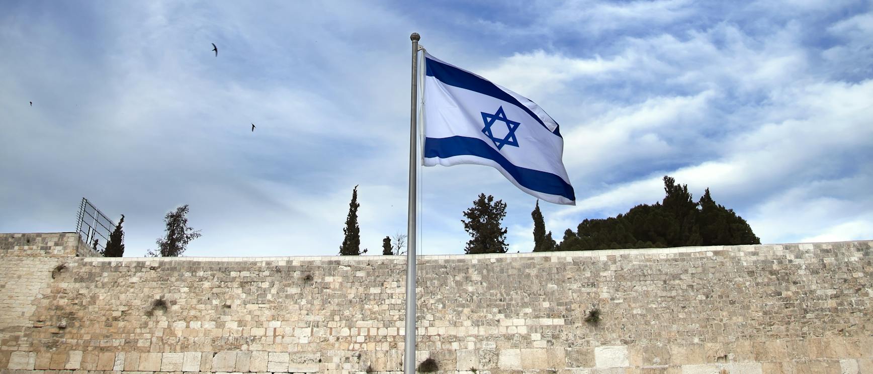 Israeli flag over Western Wall
