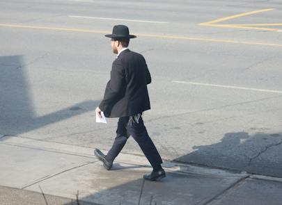 Haredi Jews walk down the street Toronto Canada (Shutterstock) Haredi Jews walk down the street Toronto Canada (Shutterstock)