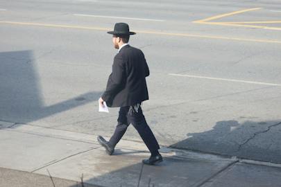 Haredi Jews walk down the street Toronto Canada (Shutterstock)