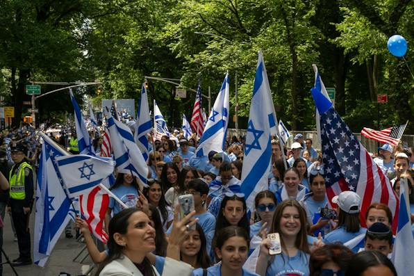 Celebrants march in the Israel Day Parade on Fifth Avenue in New York City (Shutterstock) Celebrants march in the Israel Day Parade on Fifth Avenue in New York City (Shutterstock)