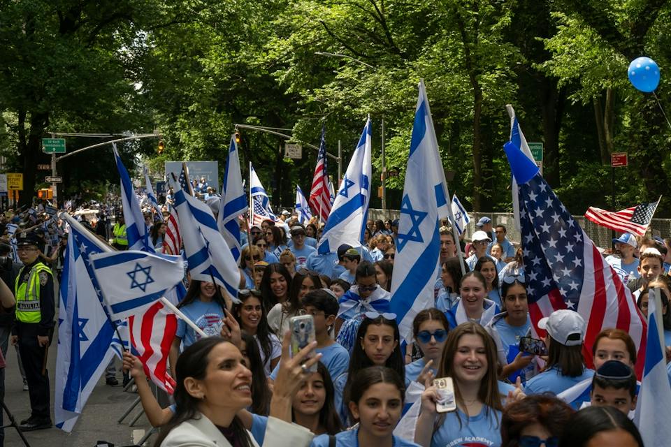 Celebrants march in the Israel Day Parade on Fifth Avenue in New York City (Shutterstock) Celebrants march in the Israel Day Parade on Fifth Avenue in New York City (Shutterstock)