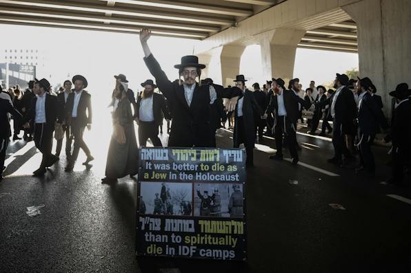 Anti-enlistment protest, Bnei Brak, August 24, 2026. (Mostafa Alkharouf/Anadolu via Getty Images) Anti-enlistment protest, Bnei Brak, August 24, 2026. (Mostafa Alkharouf/Anadolu via Getty Images)