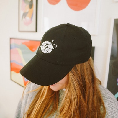level nine studio office girl with hat