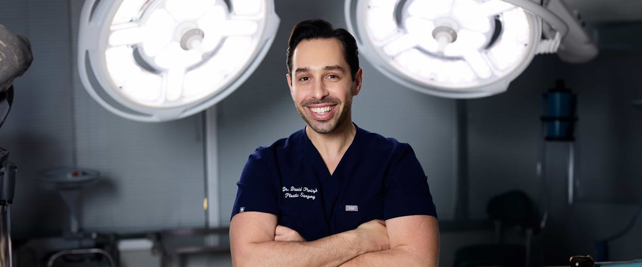 Dr. Parizh in the operating room smiling