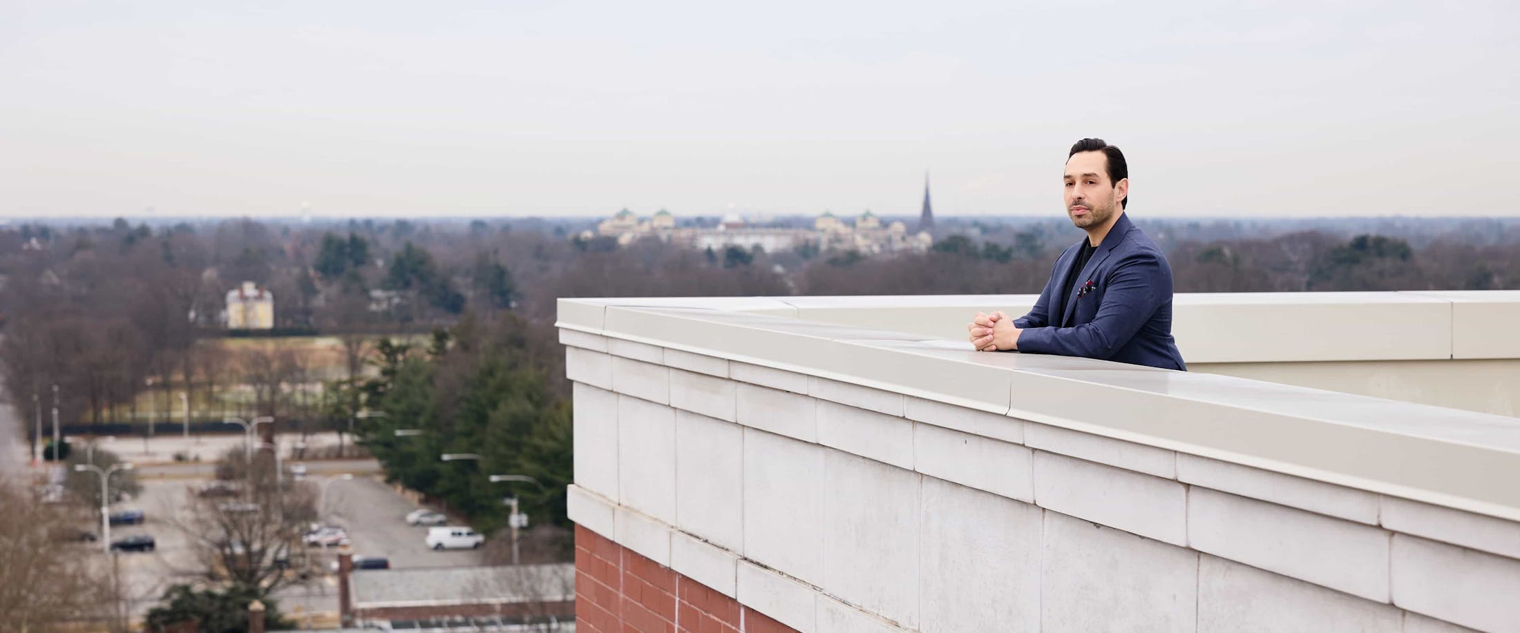 Dr. Parizh standing on a rooftop
