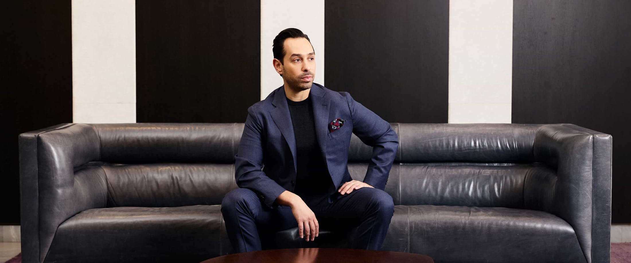Dr. Parizh sitting on couch