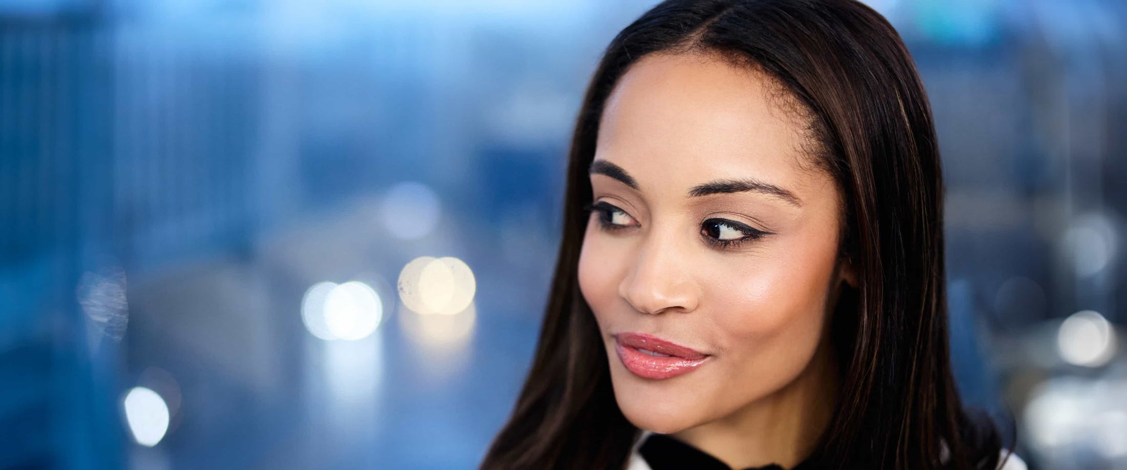 Woman looking off camera smiling