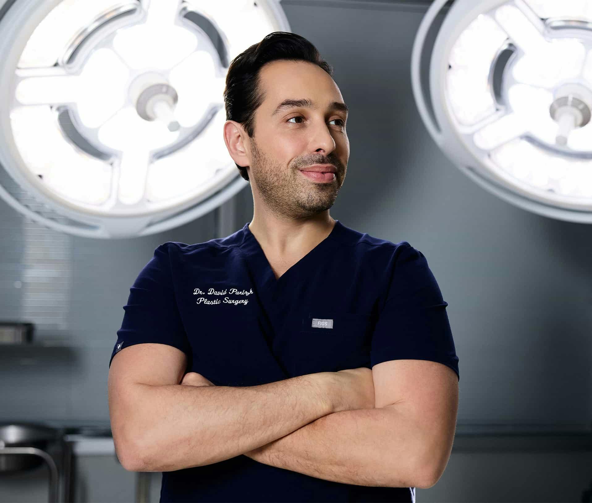 Dr. Parizh in the operating room smiling