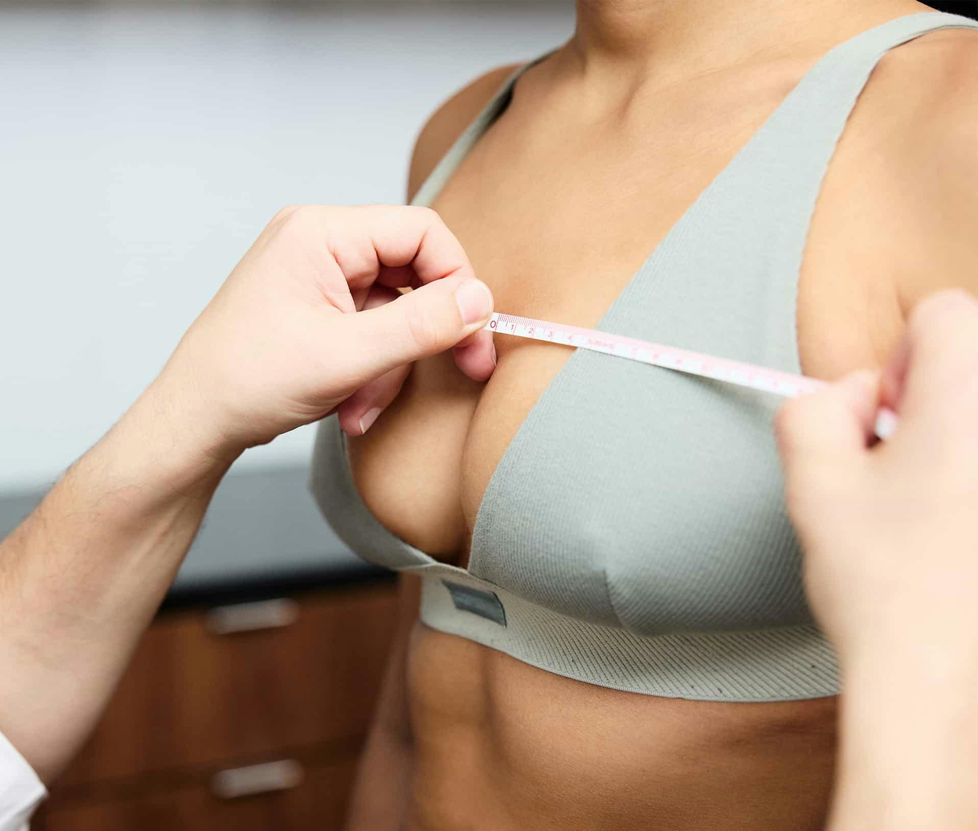 Womans chest being measured