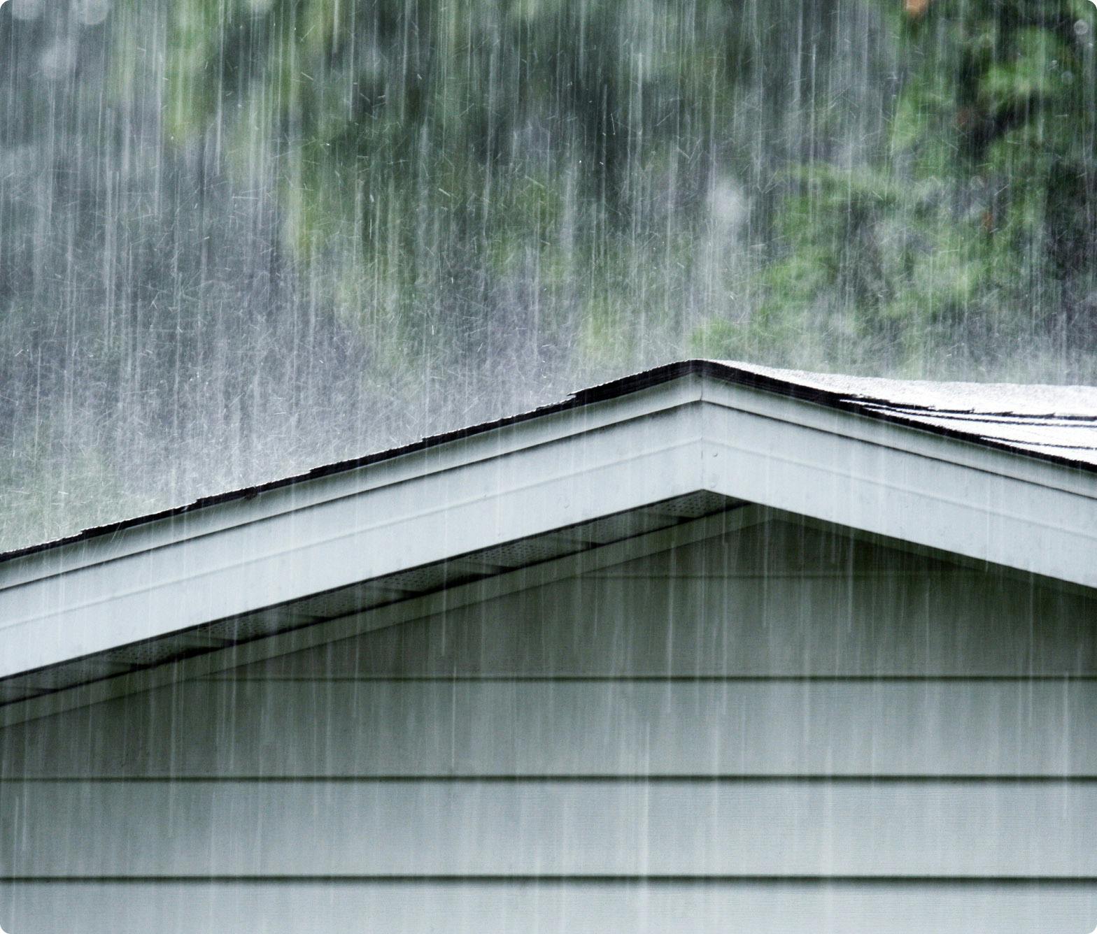 rain falling on a house