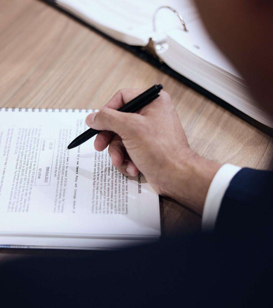 attorney pointing at paper