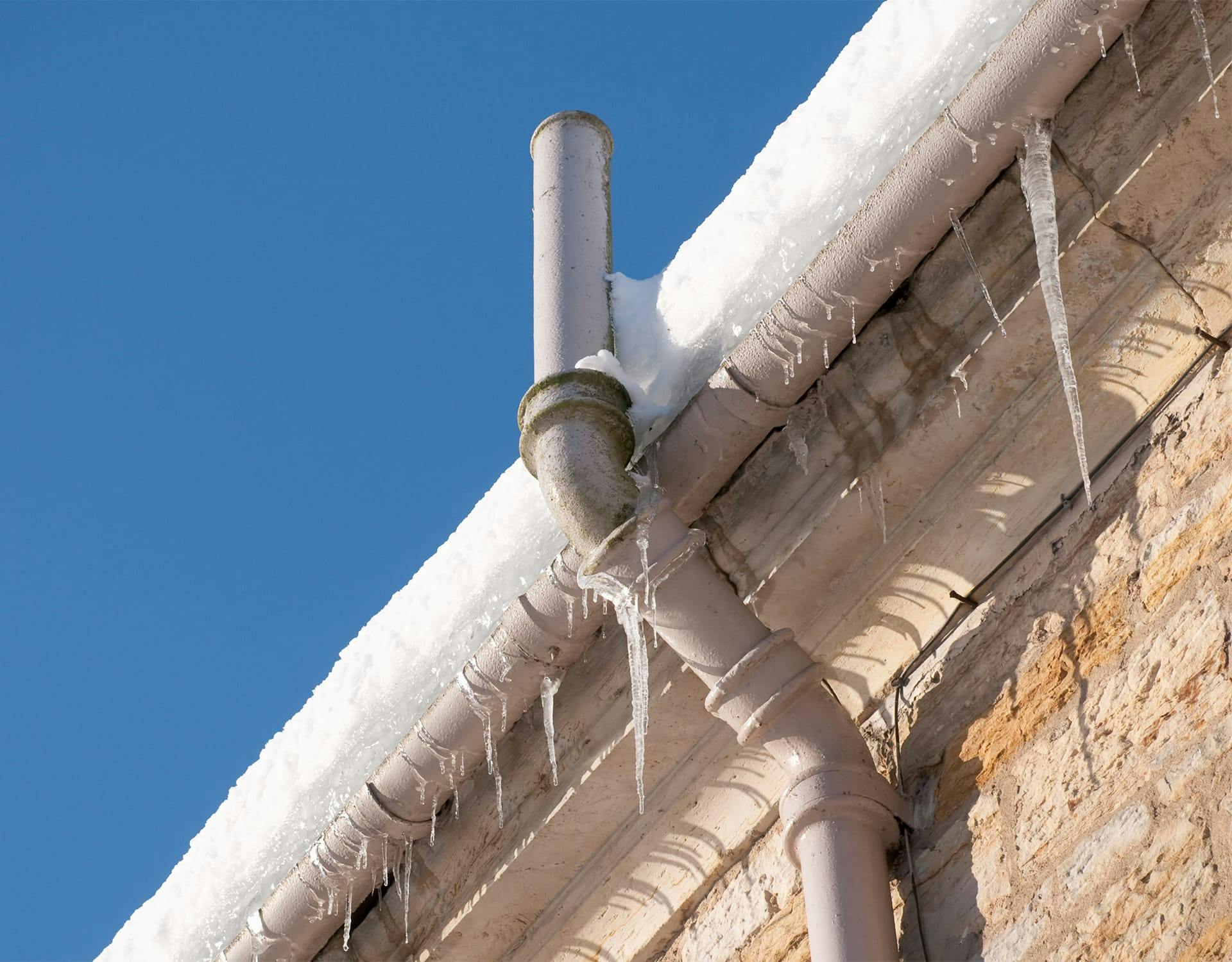 icicles hanging off a roof