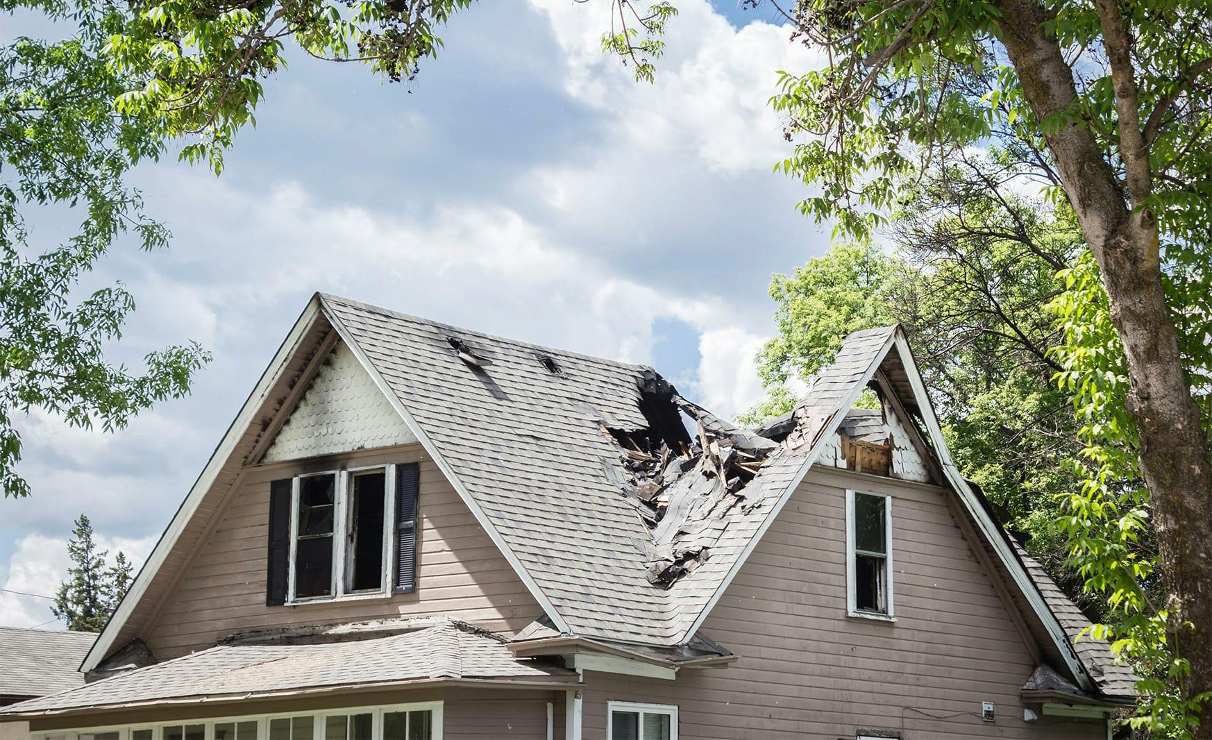house with a hole in the roof