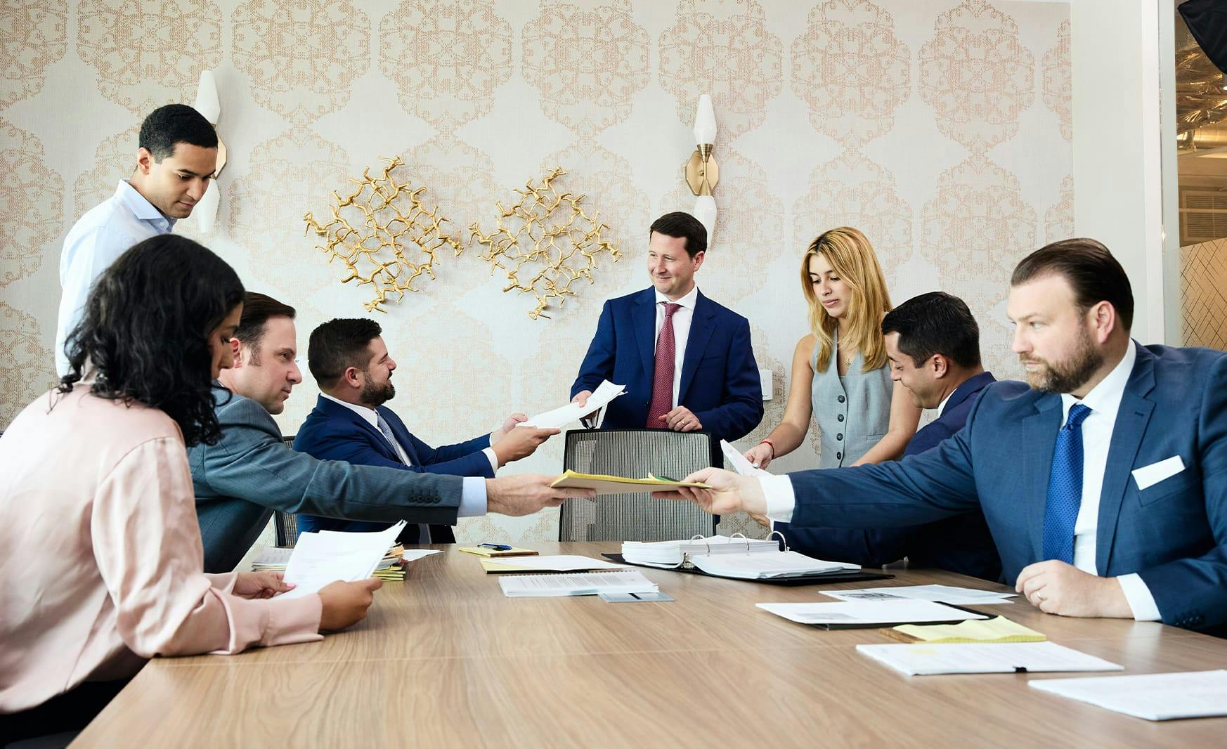 attorneys talking around a table