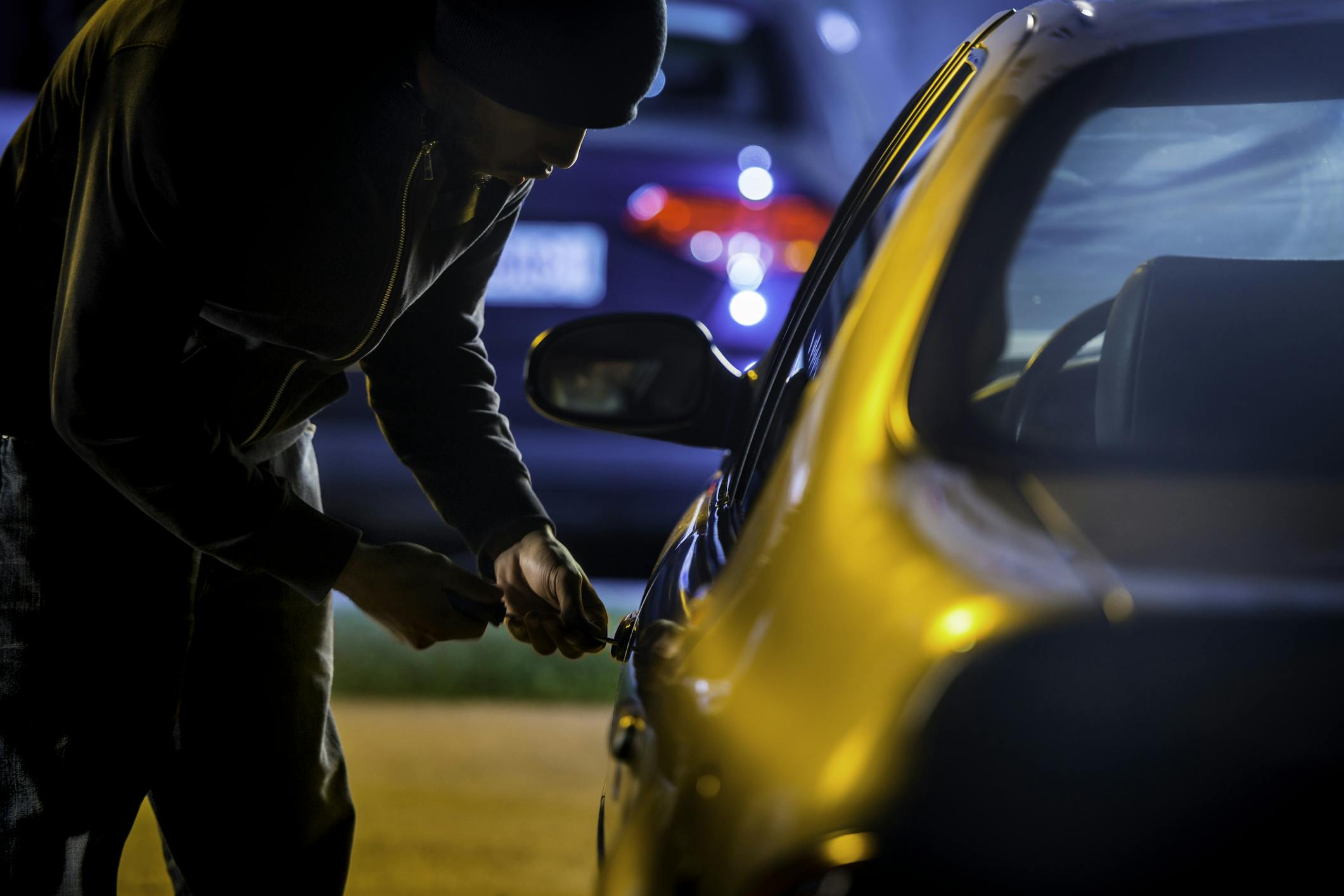 Person attempting to steal car