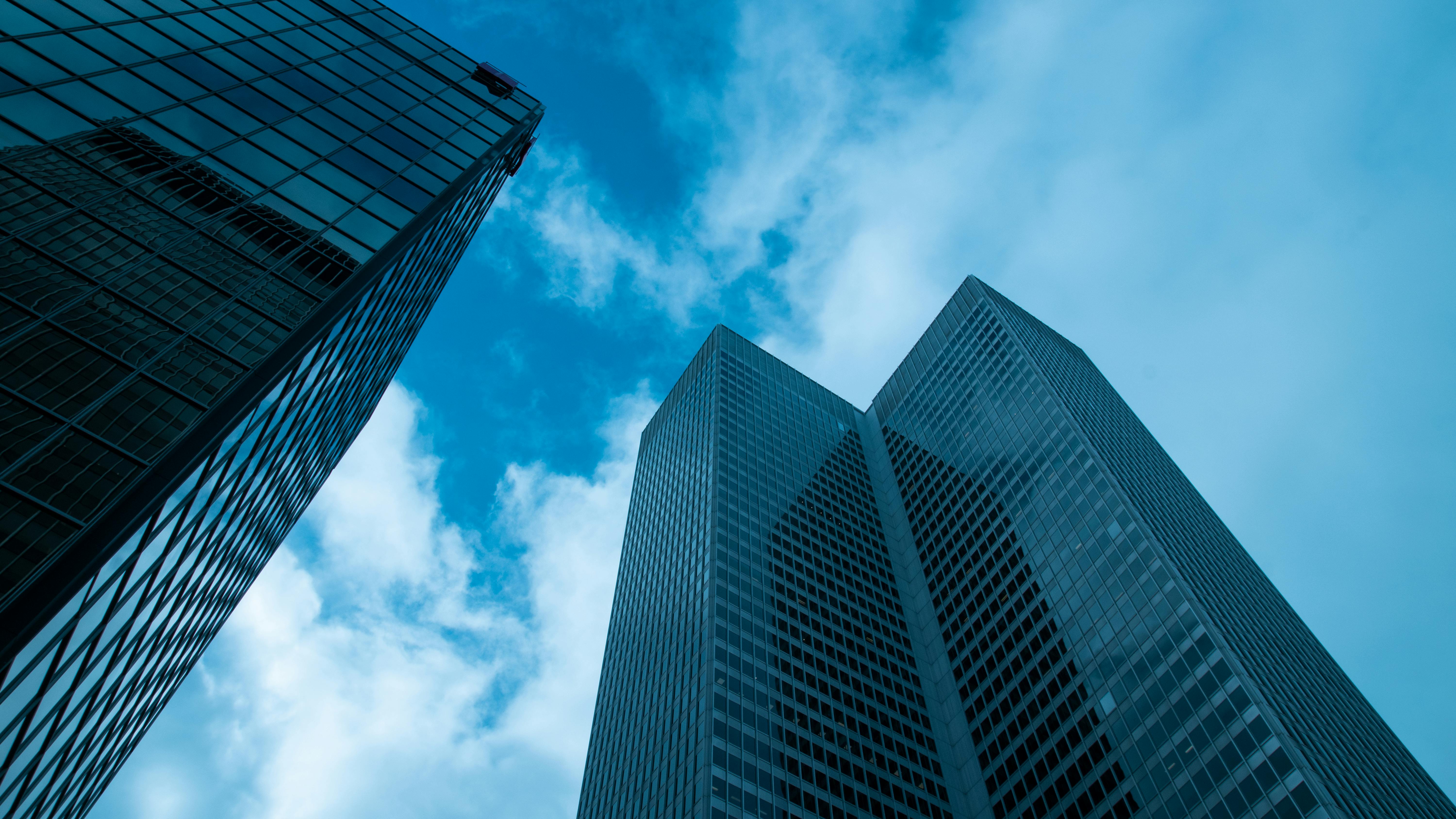 Modern office buildings against a blue sky