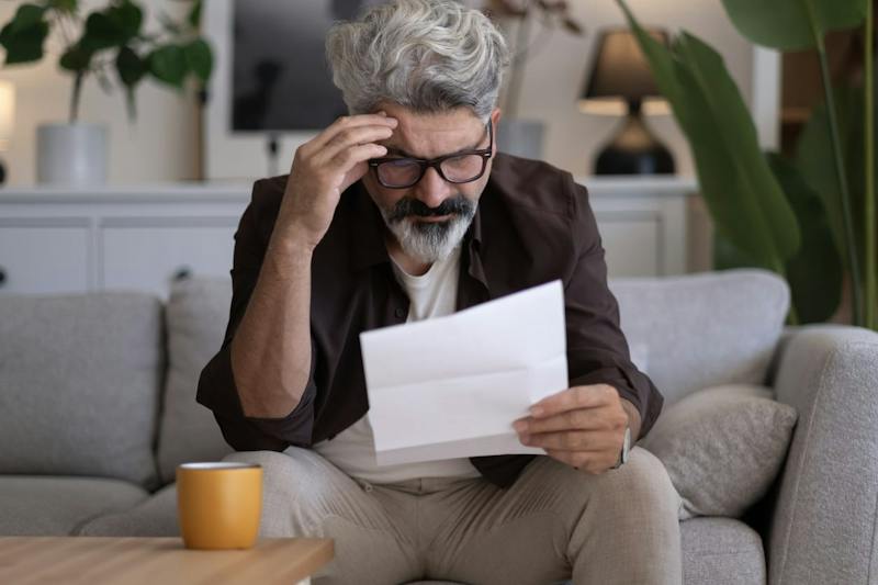 man reviewing a paper