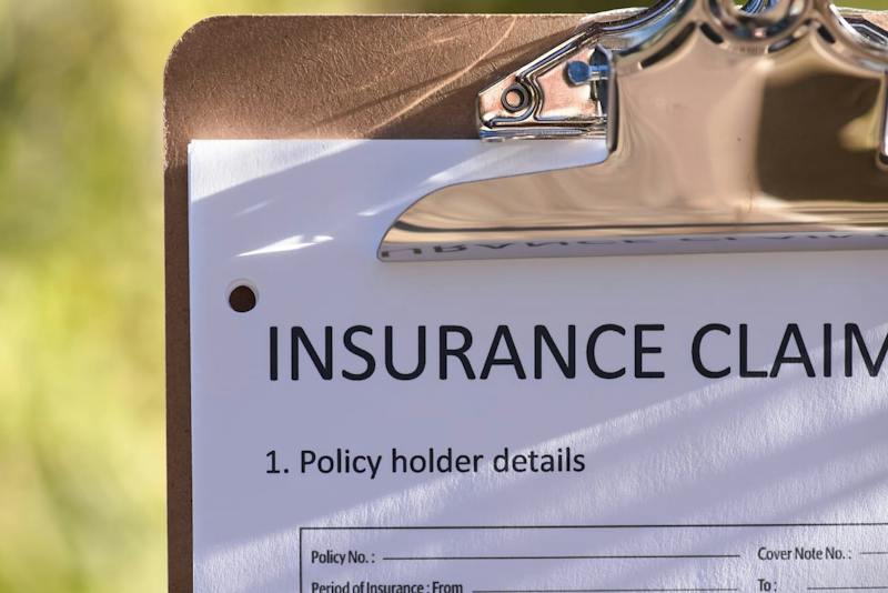 insurance claim on a clipboard