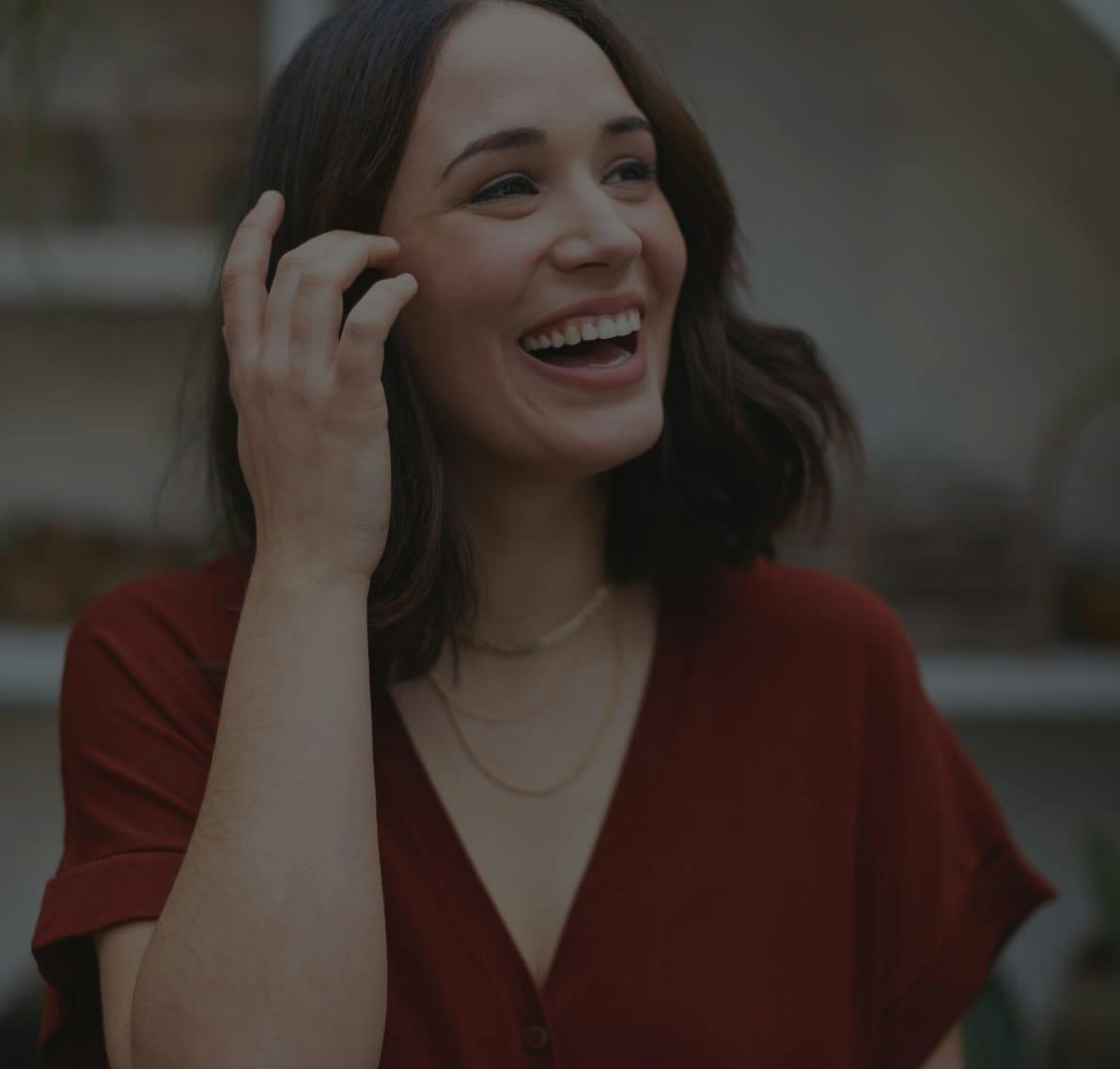 woman laughing outside