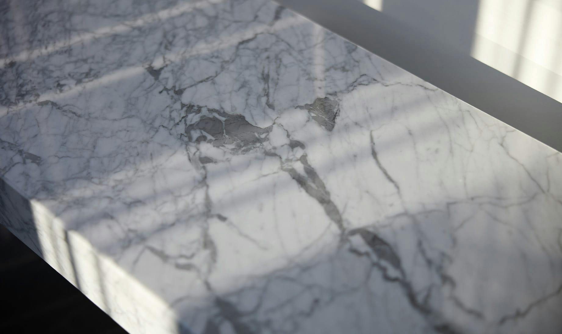 marble counter with sunlight hitting it