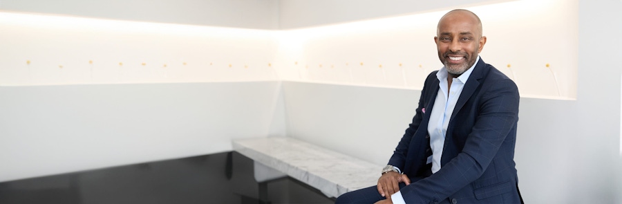 Dr. Ghassan Sinada sitting and smiling