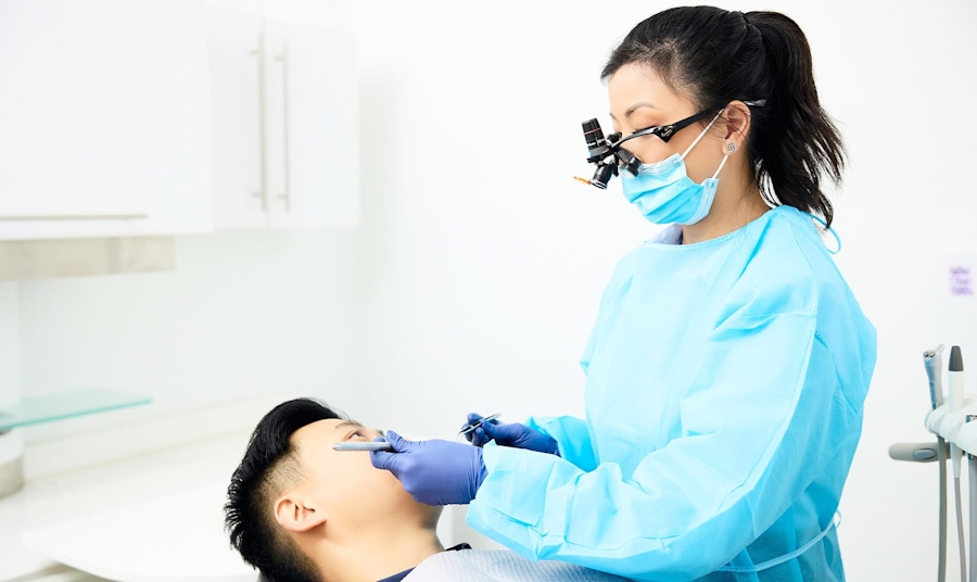 dr lucy looking at patients teeth