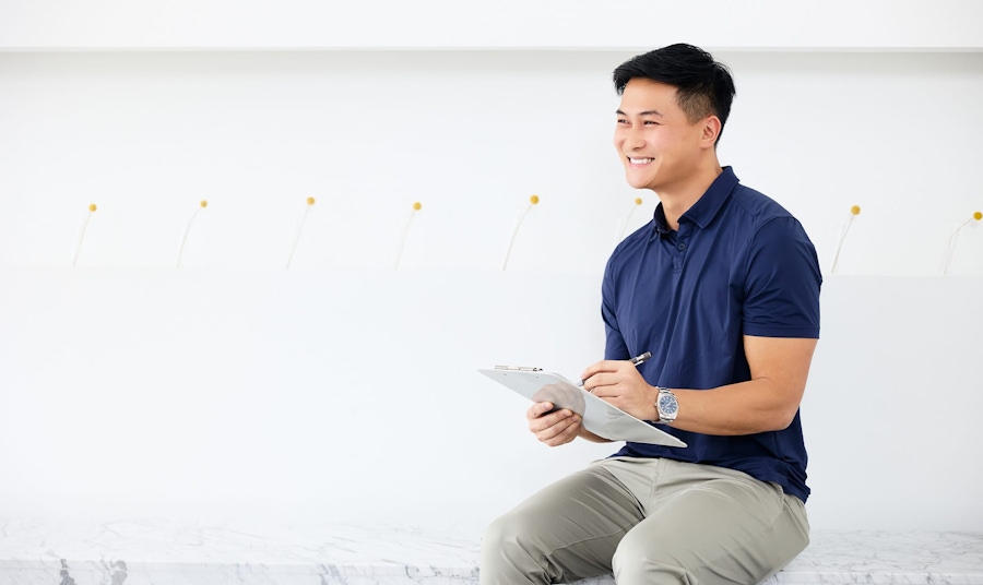 man holding clipboard