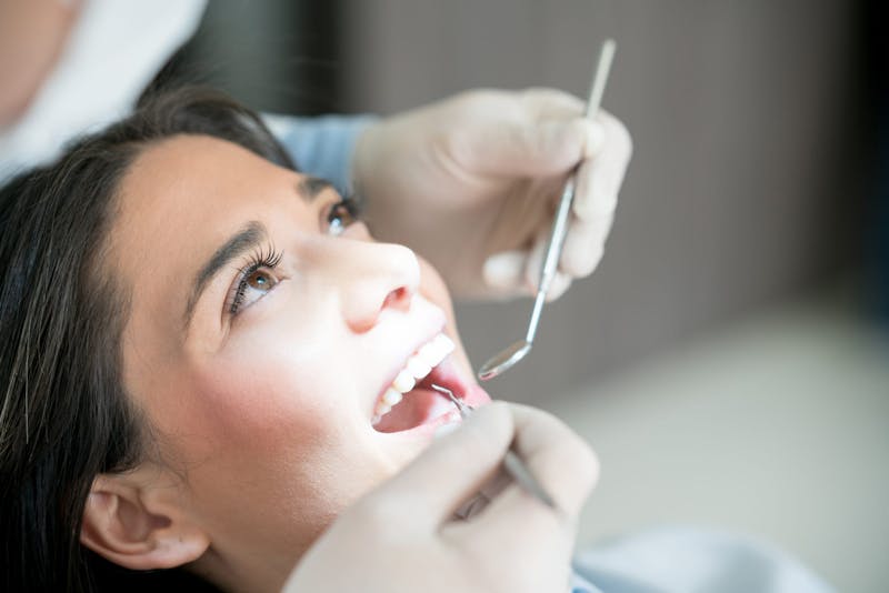 Woman receiving a dental exam