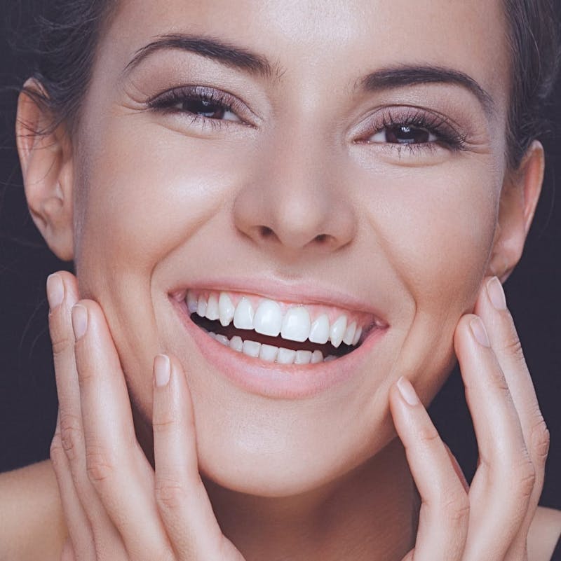 Woman smiling with white teeth