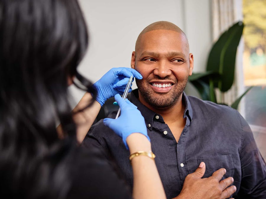 Man getting injectibles treatment