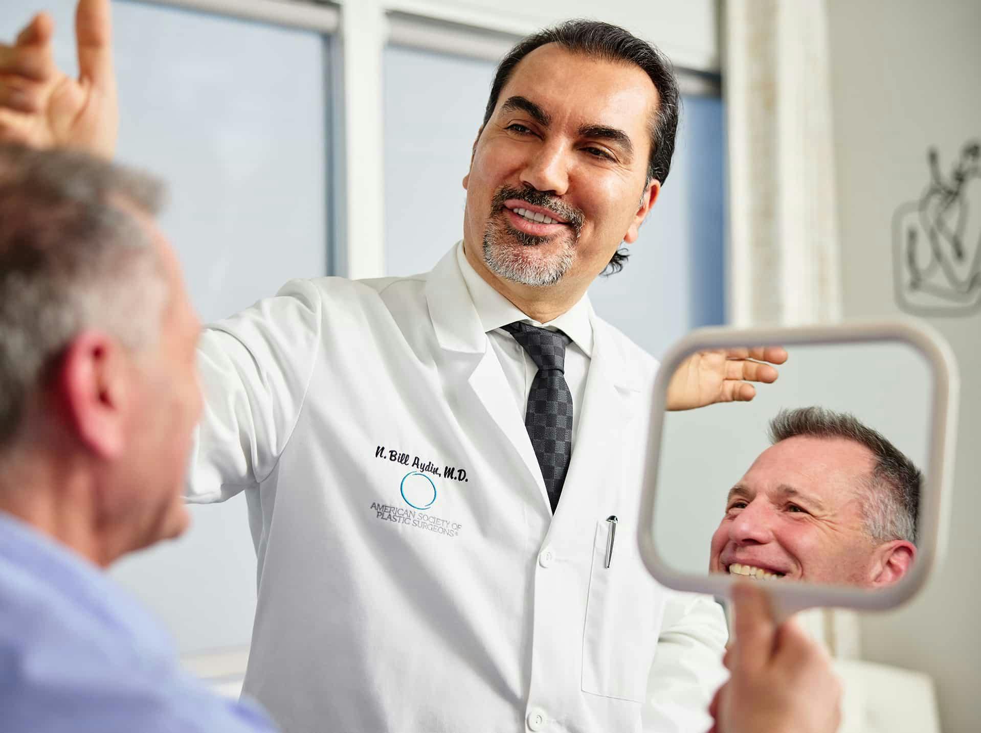 Dr. Aydin consulting with patient