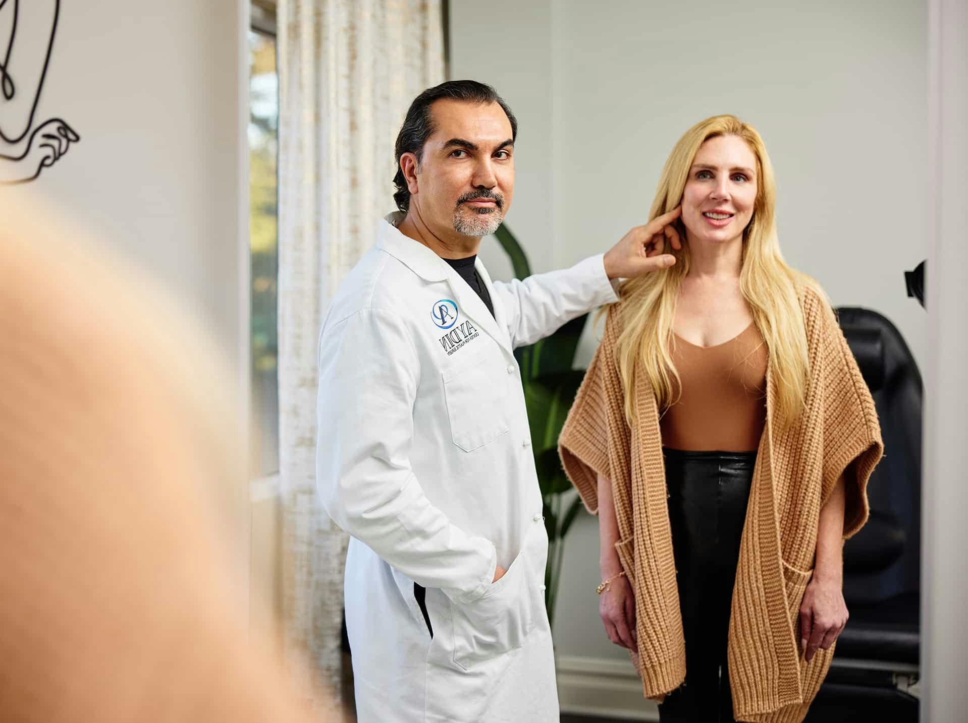 Dr. Aydin and patient during consultation
